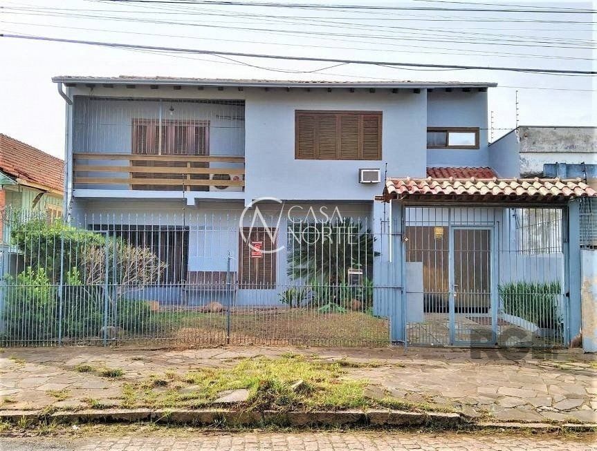 Casa à venda com 3 quartos, 262m², 1 suíte, 2 vagas, Rua Vitor Valpirio no bairro Anchieta em Porto Alegre