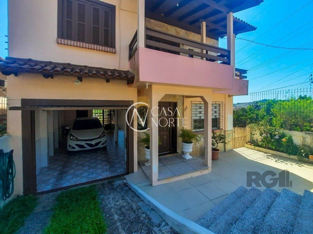 Casa à venda com 4 quartos, 240m², 2 vagas, Rua Engenheiro Oscar da Cunha Correa no bairro Jardim Carvalho em Porto Alegre