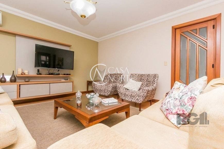 Casa à venda com 4 quartos, 380m², 2 suítes, 4 vagas, Rua Carumbé no bairro Bom Jesus em Porto Alegre