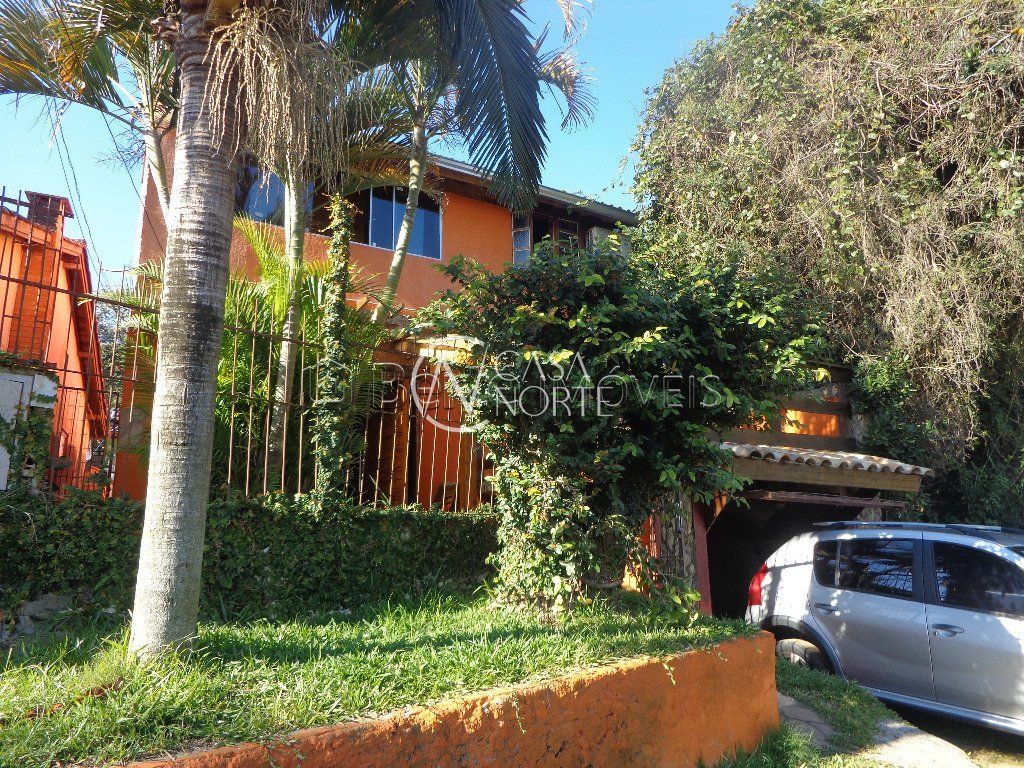 Casa à venda com 4 quartos, 101m², 1 vaga, Beco Maria Balbina no bairro Campo Novo em Porto Alegre