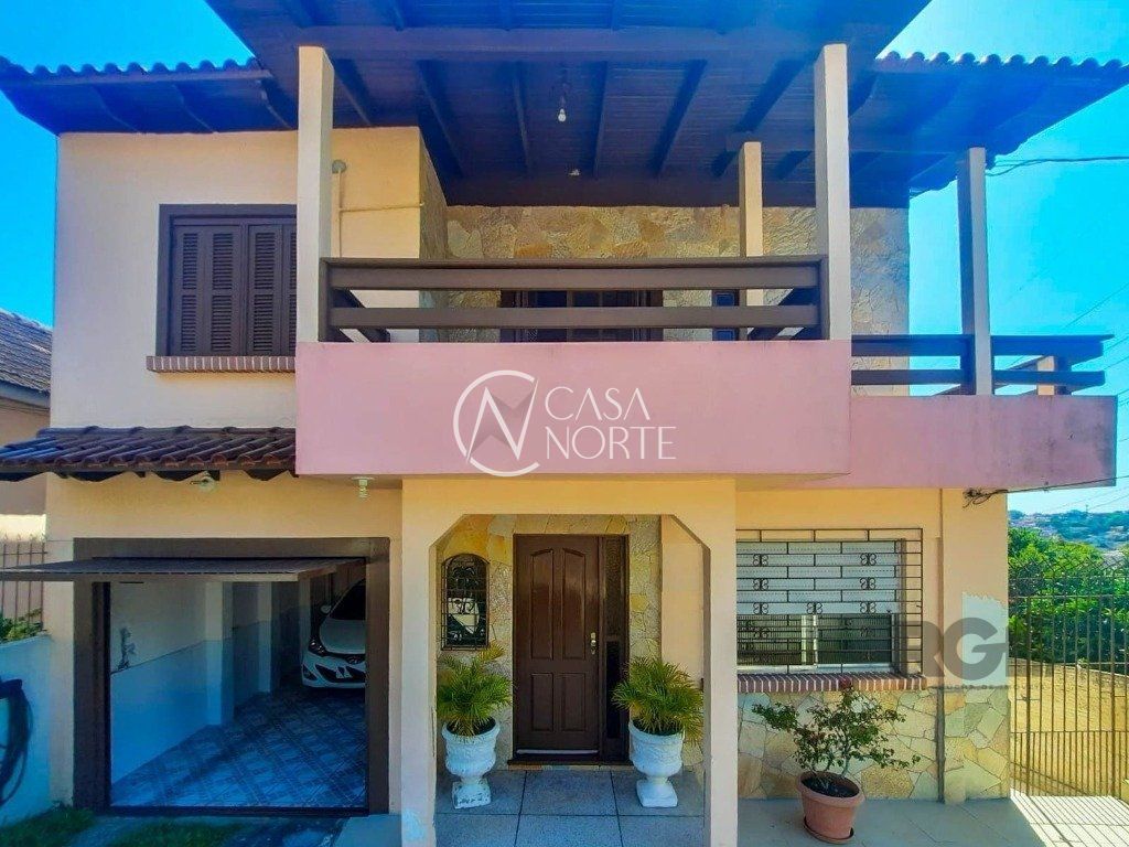 Casa à venda com 4 quartos, 240m², 2 vagas, Rua Engenheiro Oscar da Cunha Correa no bairro Jardim Carvalho em Porto Alegre