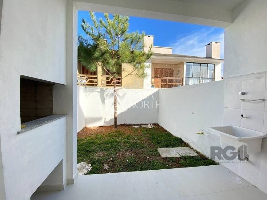 Casa à venda com 3 quartos, 126m², 2 suítes, 2 vagas, Rua Itacyr Rossi no bairro Guarujá em Porto Alegre