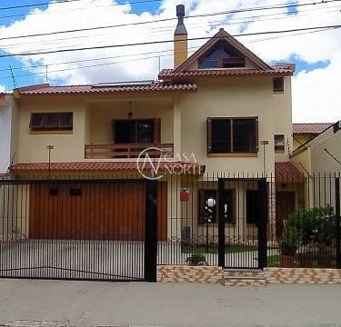 Casa à venda com 3 quartos, 287m², 1 suíte, 4 vagas, Rua Padre Todesco no bairro Partenon em Porto Alegre