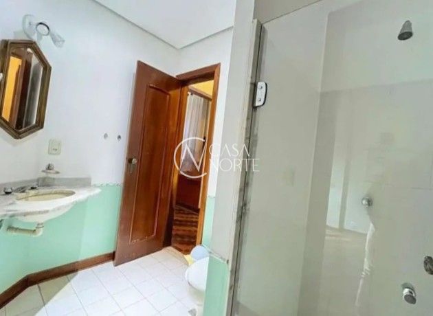 Casa à venda com 4 quartos, 374m², 2 suítes, 4 vagas, Rua Doutor Possidônio Cunha no bairro Vila Assunção em Porto Alegre
