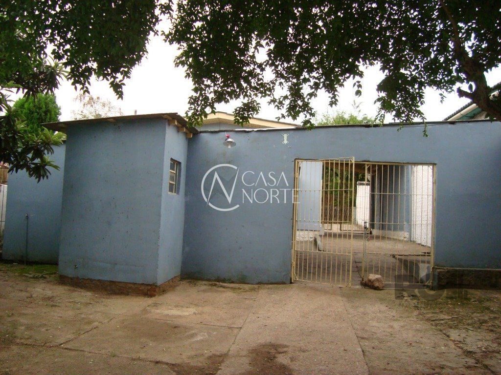 Casa à venda com 2 quartos, 1234m², 5 vagas, Rua Dário Totta no bairro Teresópolis em Porto Alegre