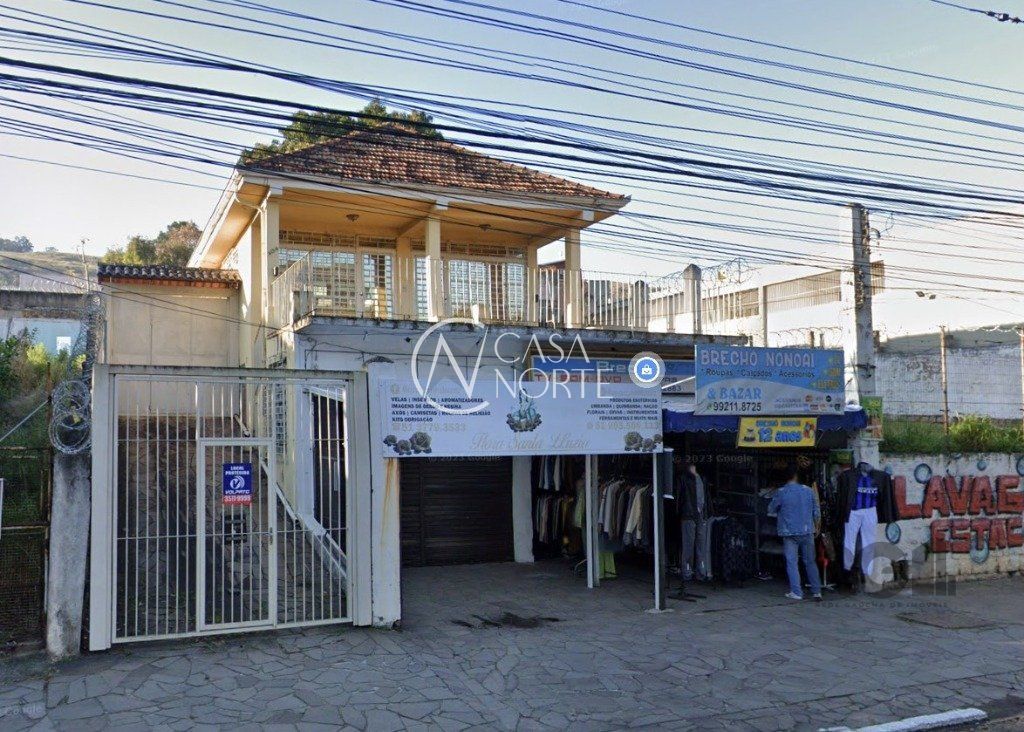 Casa à venda com 4 quartos, 307m², 4 vagas, Avenida Nonoai no bairro Nonoai em Porto Alegre