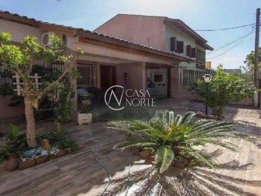 Casa à venda com 3 quartos, 131m², 1 suíte, 3 vagas, Rua Menezes Paredes no bairro Nonoai em Porto Alegre