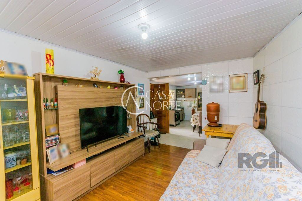 Casa à venda com 2 quartos, 100m², 2 vagas, Rua Nilo Torres no bairro Coronel Aparício Borges em Porto Alegre