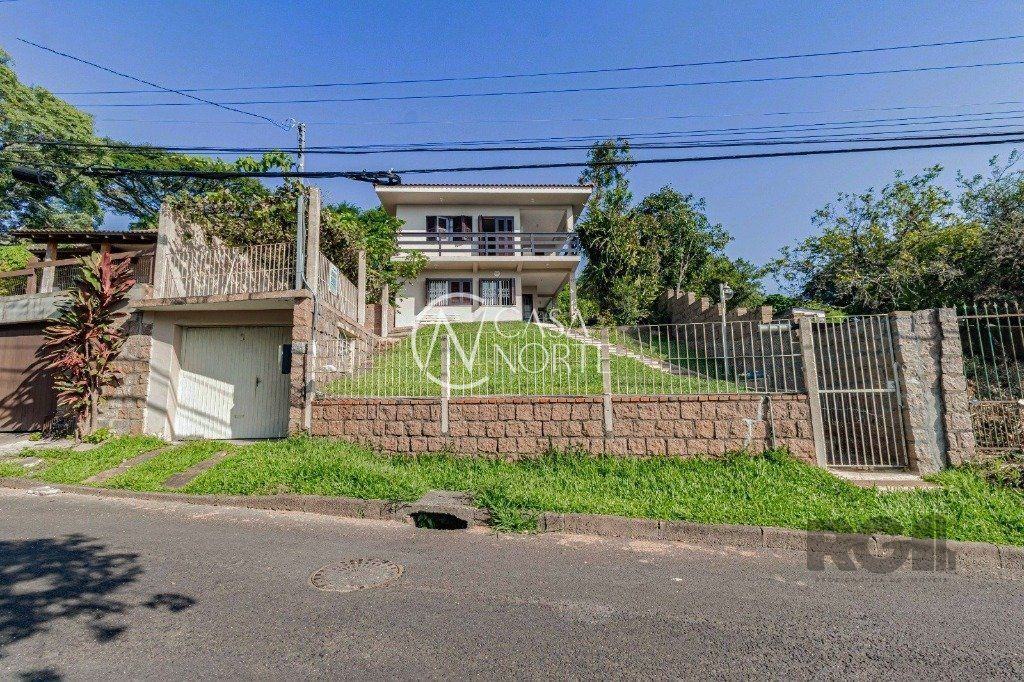 Casa à venda com 3 quartos, 267m², 1 suíte, 1 vaga, Rua Liberal no bairro Tristeza em Porto Alegre