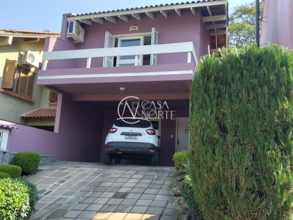 Casa de Condomínio à venda com 3 quartos, 190m², 1 suíte, 4 vagas, Rua Erechim no bairro Nonoai em Porto Alegre