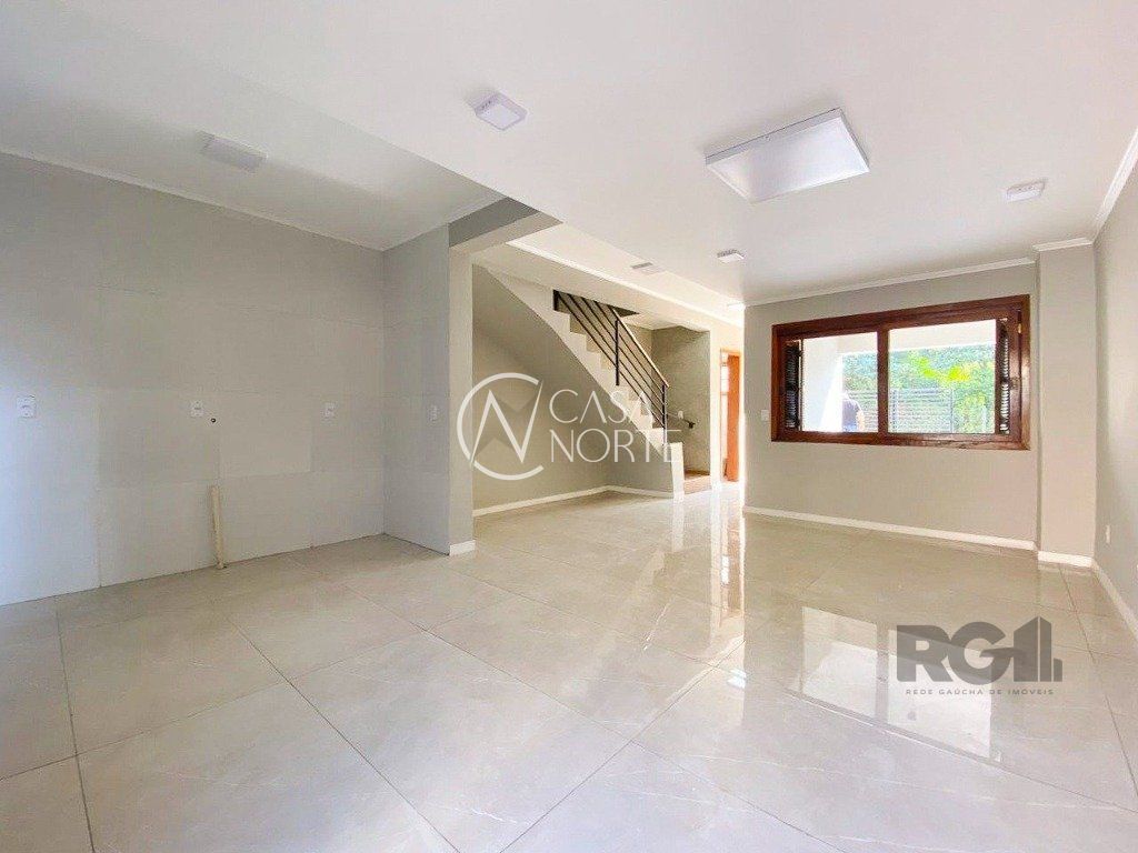 Casa à venda com 3 quartos, 103m², 1 suíte, 2 vagas, Rua Ronaldo Molina de Quadros no bairro Mário Quintana em Porto Alegre