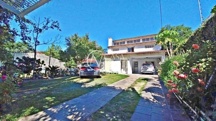 Casa à venda com 4 quartos, 304m², 1 suíte, 2 vagas, Rua João Palma da Silva no bairro Espírito Santo em Porto Alegre
