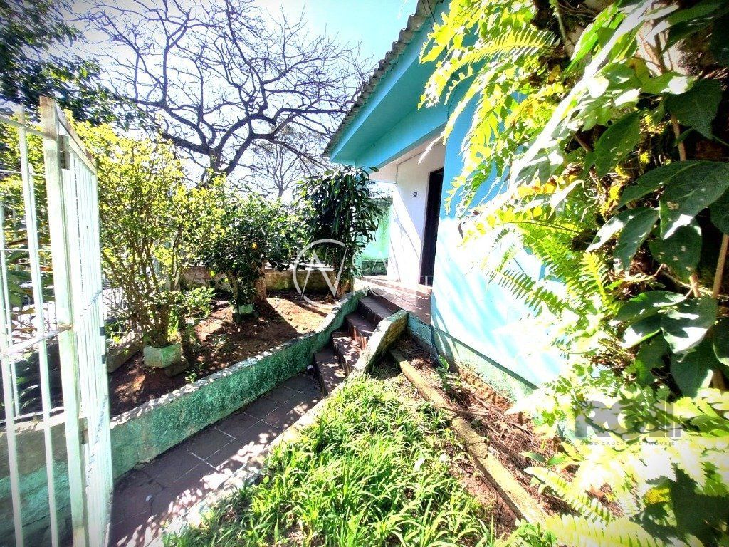 Casa à venda com 4 quartos, 95m², 1 vaga, Rua Sebastião Wolf no bairro Nonoai em Porto Alegre