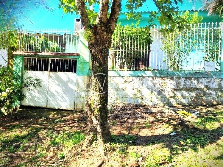 Casa à venda com 4 quartos, 95m², 1 vaga, Rua Sebastião Wolf no bairro Nonoai em Porto Alegre