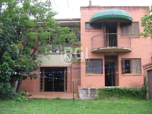Casa à venda com 3 quartos, 260m², 1 suíte, 7 vagas, Rua Frederico Etzberger no bairro Nonoai em Porto Alegre