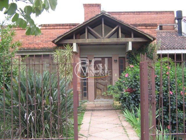 Casa à venda com 3 quartos, 260m², 1 suíte, 7 vagas, Rua Frederico Etzberger no bairro Nonoai em Porto Alegre