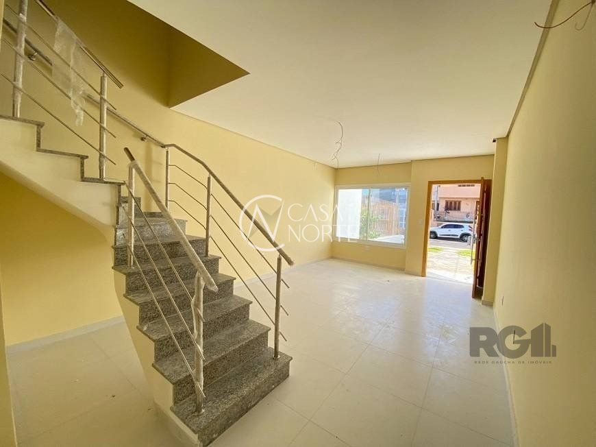 Casa à venda com 3 quartos, 126m², 2 suítes, 2 vagas, Rua Itacyr Rossi no bairro Guarujá em Porto Alegre