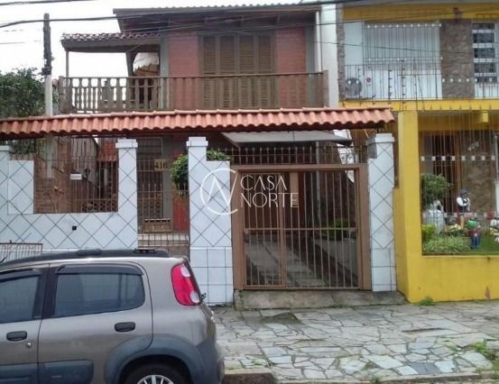 Casa à venda com 4 quartos, 276m², 1 suíte, 2 vagas, Rua Coronel José Rodrigues Sobral no bairro Partenon em Porto Alegre