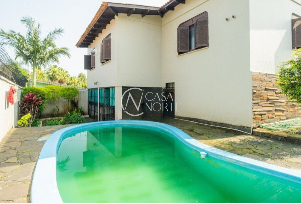 Casa à venda com 3 quartos, 400m², 1 suíte, 2 vagas, Avenida Clemenciano Barnasque no bairro Teresópolis em Porto Alegre