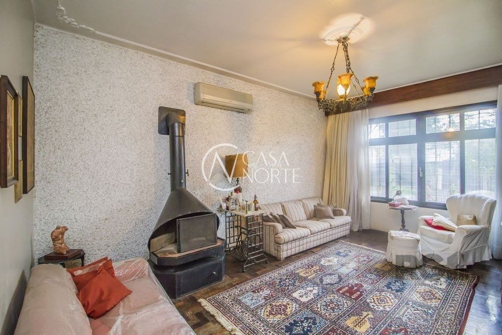 Casa à venda com 4 quartos, 258m², 1 suíte, 3 vagas, Rua Bernardino Caetano Fraga no bairro Santa Tereza em Porto Alegre