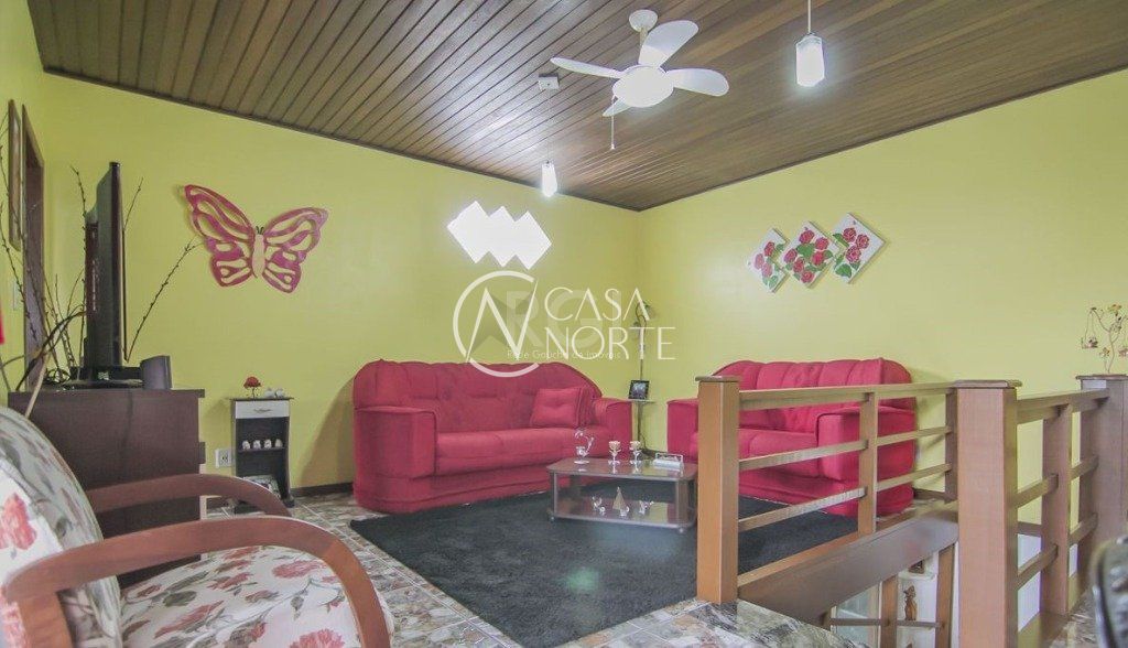 Casa à venda com 3 quartos, 252m², 1 suíte, 3 vagas, Rua Lola de Oliveira no bairro Parque Santa Fé em Porto Alegre