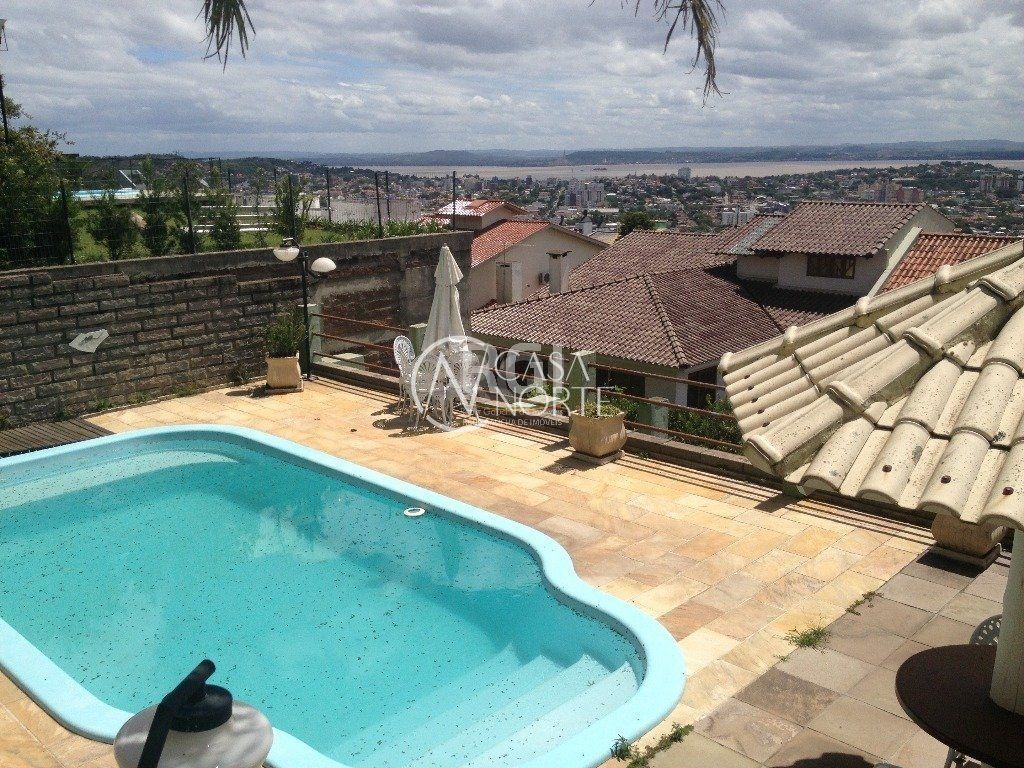 Casa de Condomínio à venda com 4 quartos, 350m², 1 suíte, 2 vagas, Rua Alcebiades Antônio dos Santos no bairro Nonoai em Porto Alegre