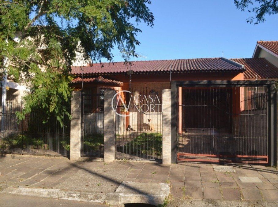 Casa à venda com 3 quartos, 178m², 1 suíte, 3 vagas, Rua Dinarte de Albuquerque no bairro Parque Santa Fé em Porto Alegre