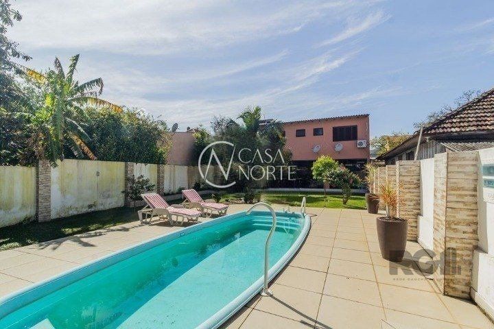 Casa à venda com 3 quartos, 216m², 2 suítes, Rua Humberto de Campos no bairro Partenon em Porto Alegre