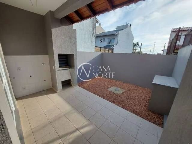 Casa à venda com 3 quartos, 122m², 1 suíte, 2 vagas, Rua Itacyr Rossi no bairro Guarujá em Porto Alegre
