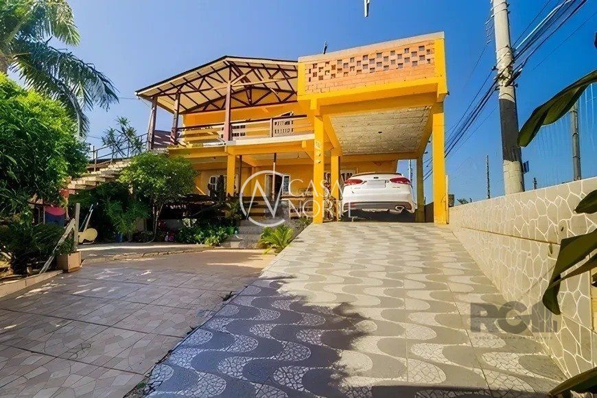 Casa à venda com 4 quartos, 50m², 1 suíte, 3 vagas, Rua Rui Barbosa no bairro Lomba do Pinheiro em Porto Alegre