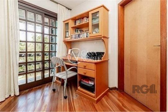 Casa à venda com 3 quartos, 260m², 1 suíte, 3 vagas, Rua Luiz Eurico Tejera Lisboa no bairro Costa e Silva em Porto Alegre