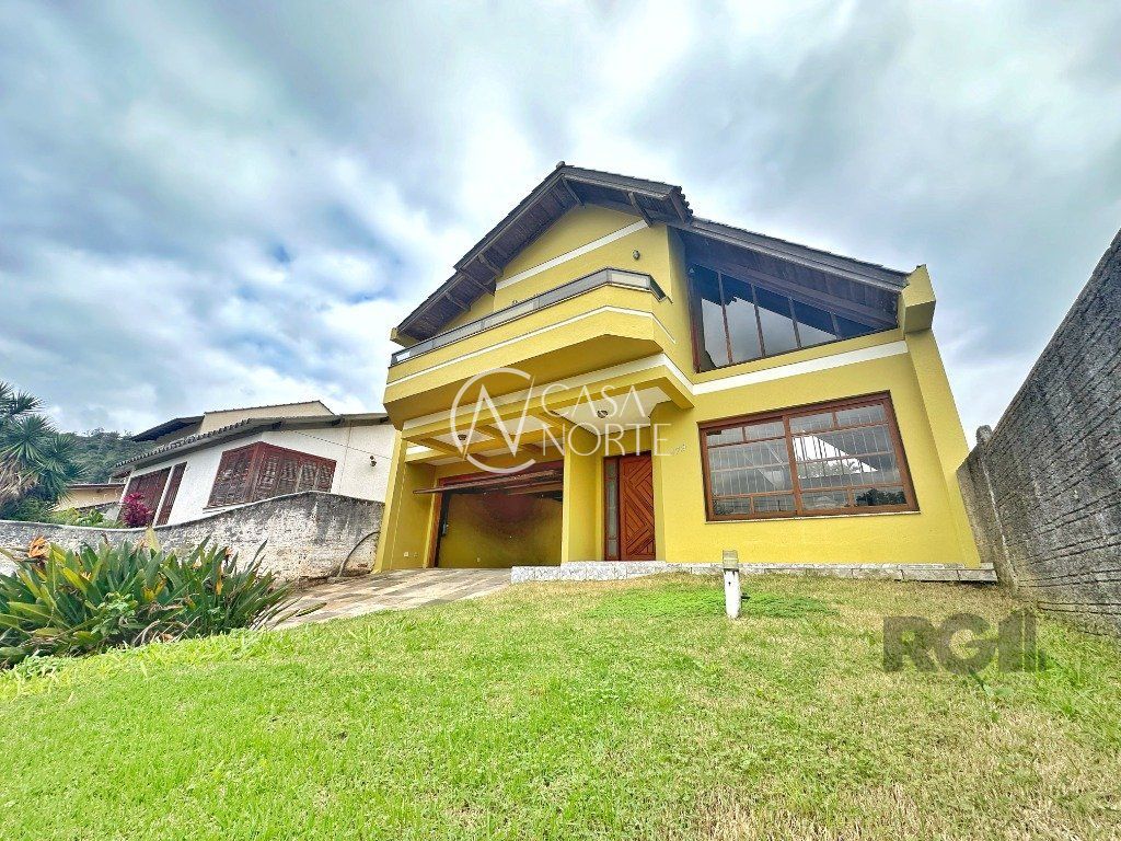 Casa à venda com 3 quartos, 255m², 1 suíte, 4 vagas, Rua Costa Lima no bairro Nonoai em Porto Alegre