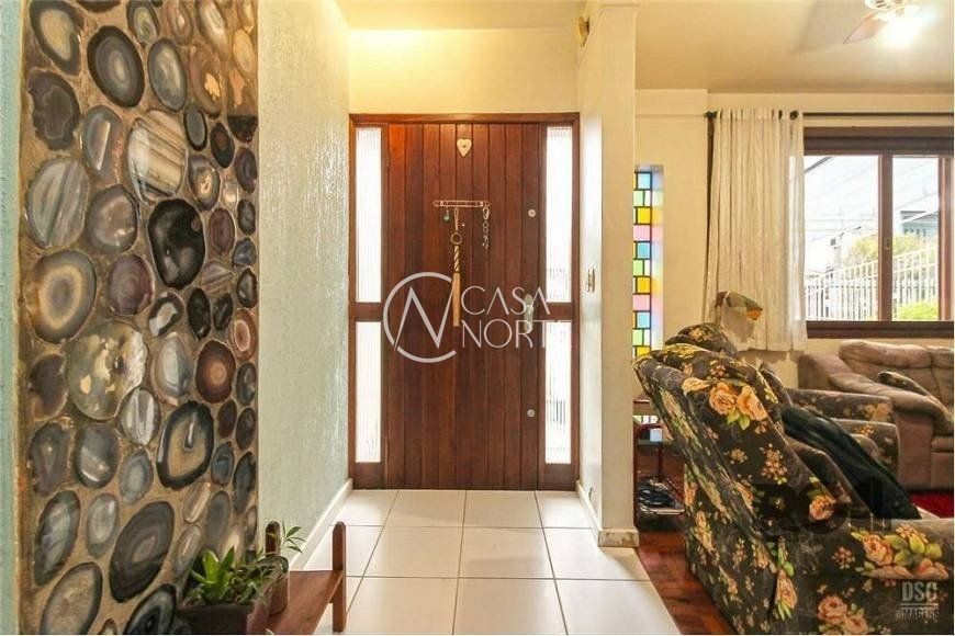 Casa à venda com 4 quartos, 285m², 1 suíte, 4 vagas, Rua Doutor Murtinho no bairro Bom Jesus em Porto Alegre