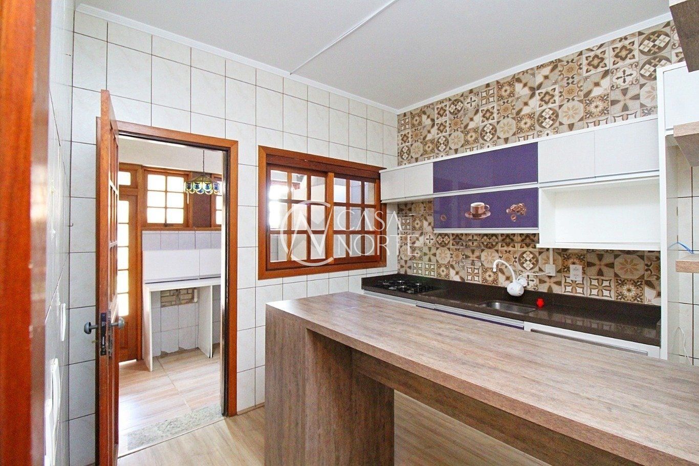 Casa à venda com 3 quartos, 155m², 1 suíte, 2 vagas, Rua Jacundá no bairro Guarujá em Porto Alegre