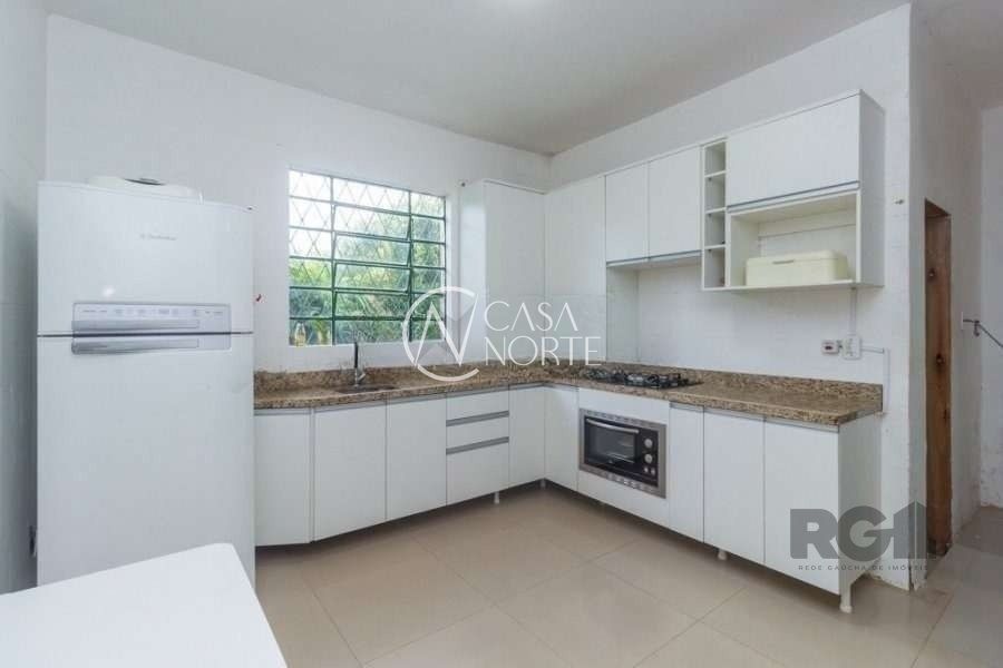 Casa à venda com 4 quartos, 160m², 2 suítes, 2 vagas, Rua Itagibá no bairro Santa Tereza em Porto Alegre