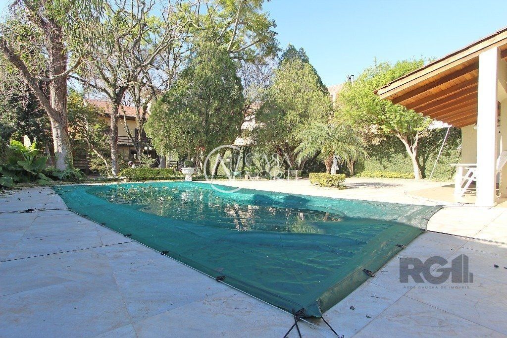 Casa à venda com 5 quartos, 230m², 1 suíte, 2 vagas, Avenida Engenheiro Ludolfo Boehl no bairro Teresópolis em Porto Alegre