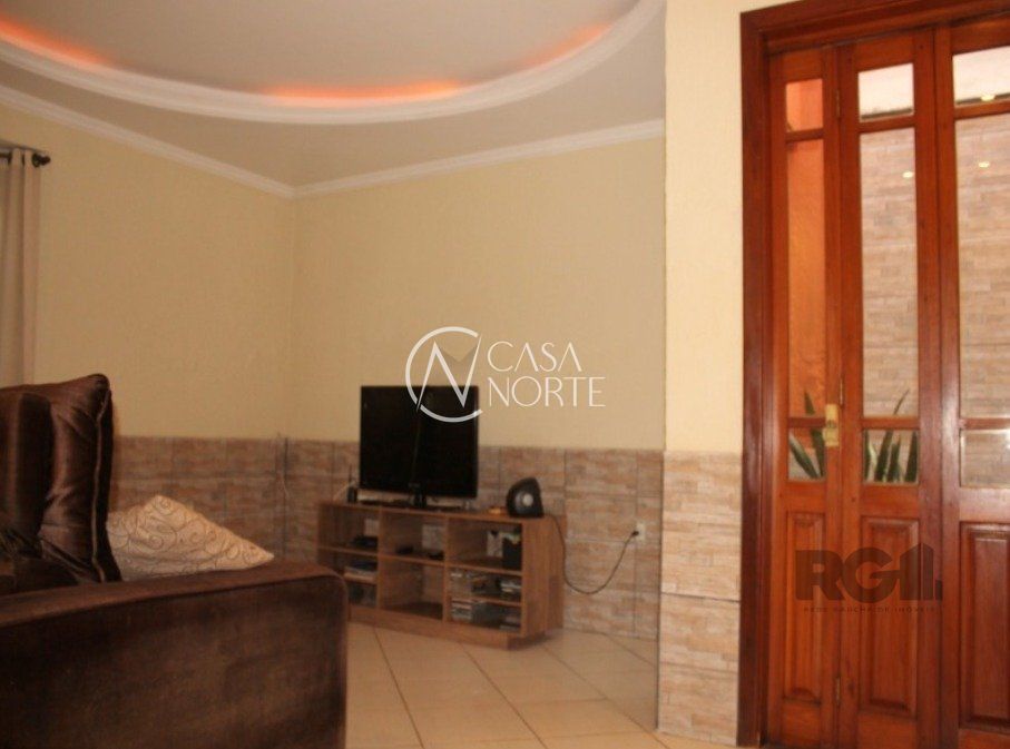 Casa à venda com 3 quartos, 178m², 1 suíte, 3 vagas, Rua Dinarte de Albuquerque no bairro Parque Santa Fé em Porto Alegre