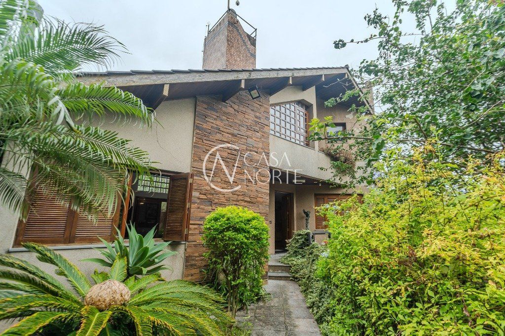 Casa à venda com 4 quartos, 400m², 1 suíte, 4 vagas, Praça Doutor Baltazar de Bem no bairro Vila Jardim em Porto Alegre