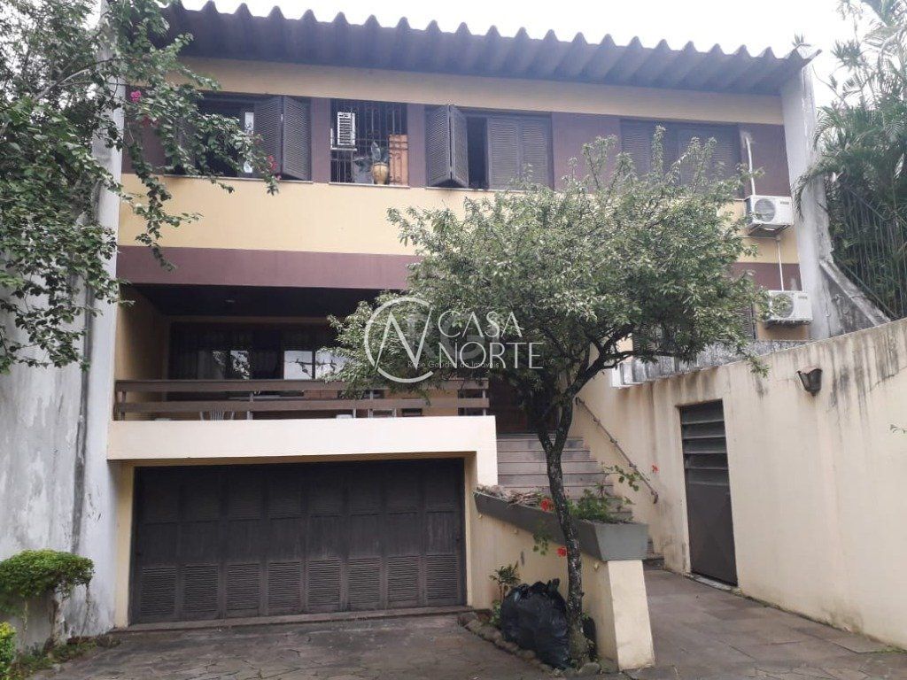 Casa à venda com 4 quartos, 311m², 2 suítes, 4 vagas, Rua Intendente Alfredo Azevedo no bairro Glória em Porto Alegre