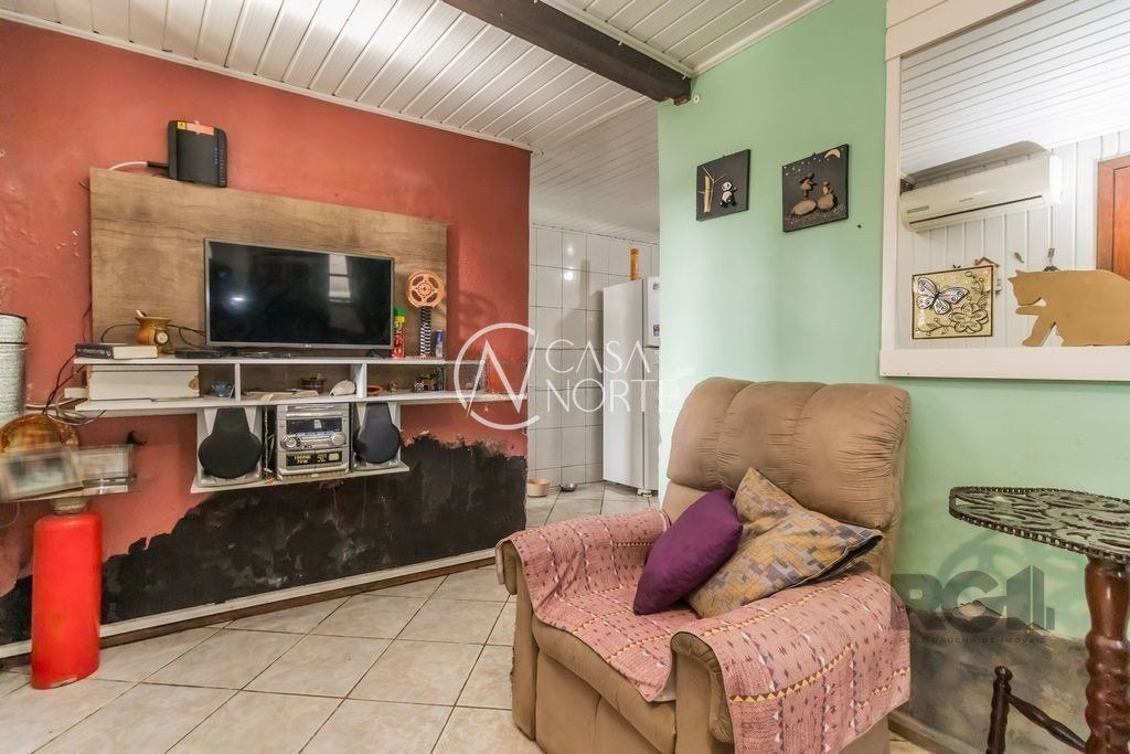 Casa à venda com 4 quartos, 224m², 2 vagas, Avenida Ipê no bairro Vila Jardim em Porto Alegre