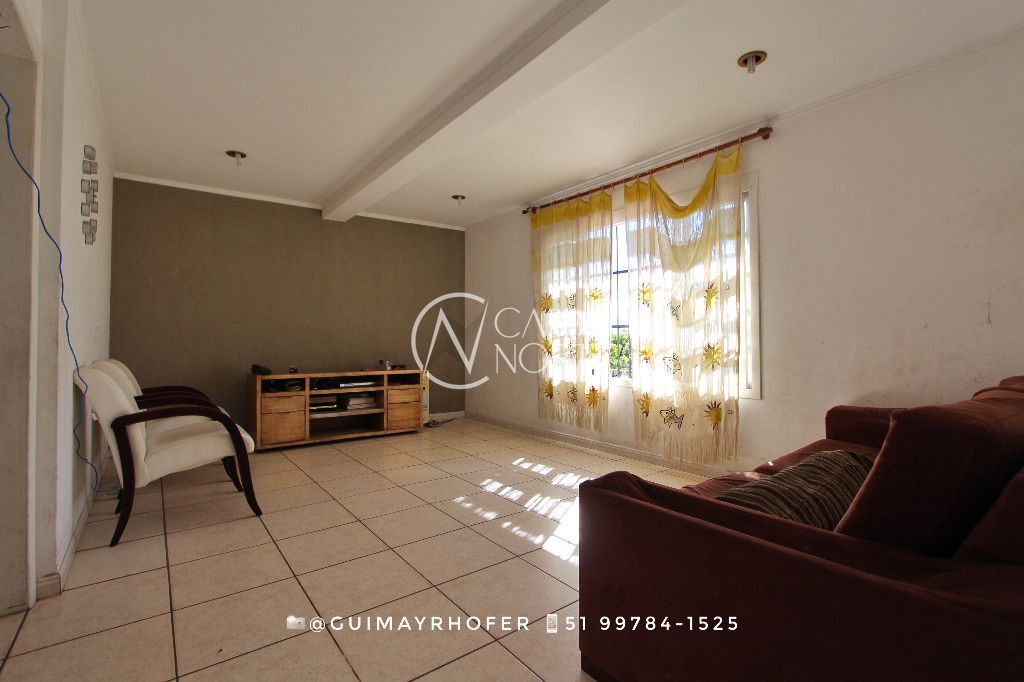 Casa à venda com 4 quartos, 229m², 4 vagas, Avenida Joracy Camargo no bairro Santa Tereza em Porto Alegre