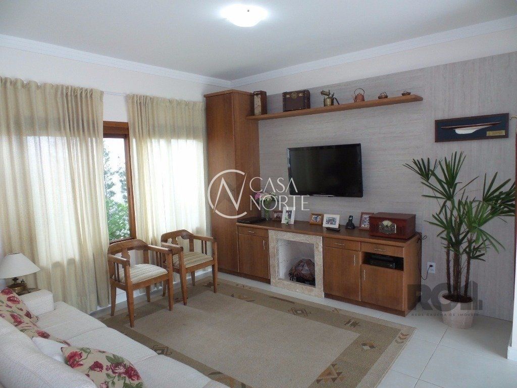 Casa de Condomínio à venda com 3 quartos, 198m², 1 suíte, 4 vagas, Rua Francisco Solano Borges no bairro Hípica em Porto Alegre