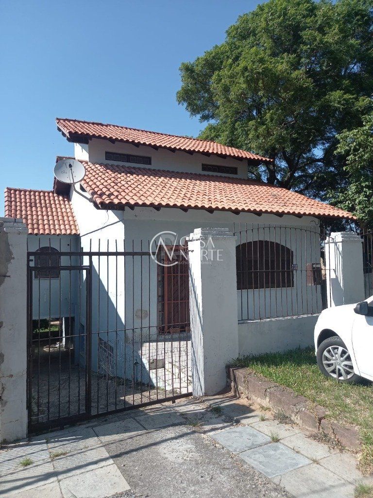 Casa à venda com 3 quartos, 345m², 3 vagas, Rua Octavio de Souza no bairro Teresópolis em Porto Alegre