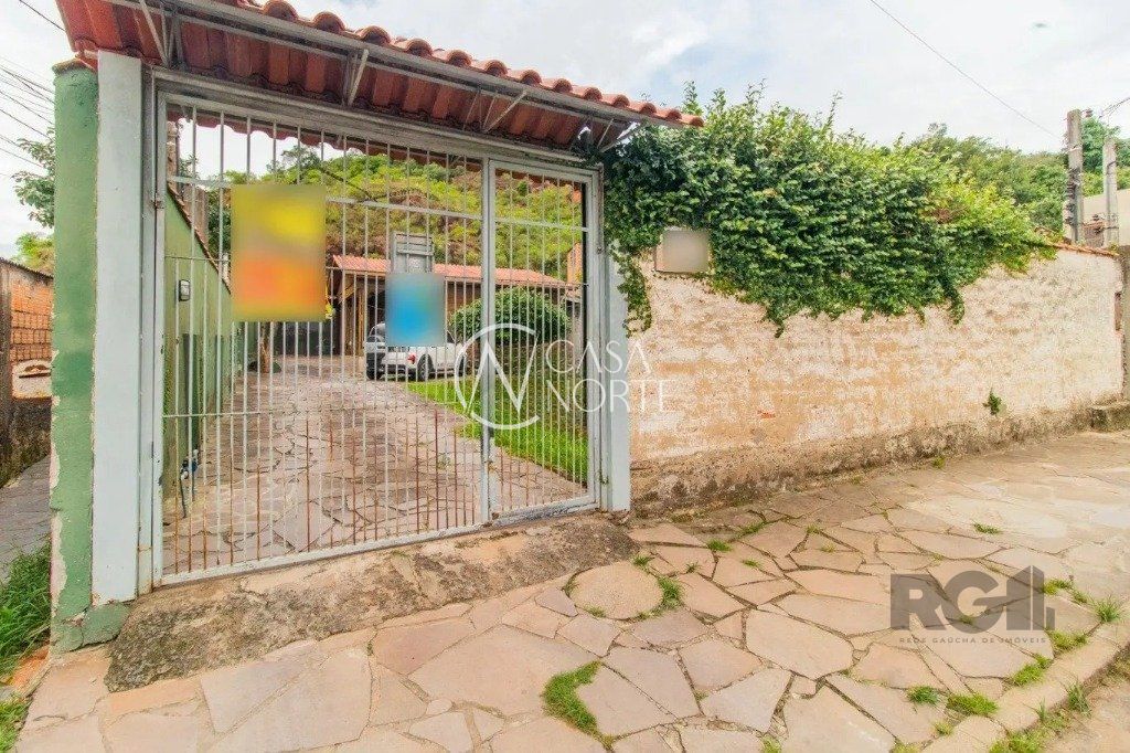 Casa à venda com 3 quartos, 114m², 5 vagas, Rua Encantadora no bairro Partenon em Porto Alegre
