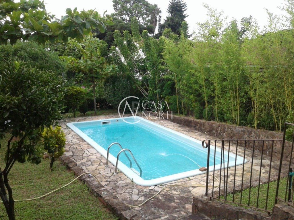 Casa à venda com 4 quartos, 311m², 2 suítes, 4 vagas, Rua Intendente Alfredo Azevedo no bairro Glória em Porto Alegre