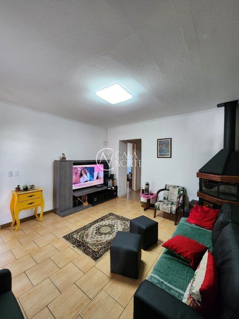 Casa à venda com 3 quartos, 152m², 3 vagas, Rua Ênio de Souza no bairro Vila Nova em Porto Alegre