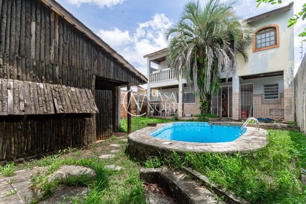 Casa à venda com 3 quartos, 286m², 2 vagas, Avenida Manoel Elias no bairro Jardim Leopoldina em Porto Alegre