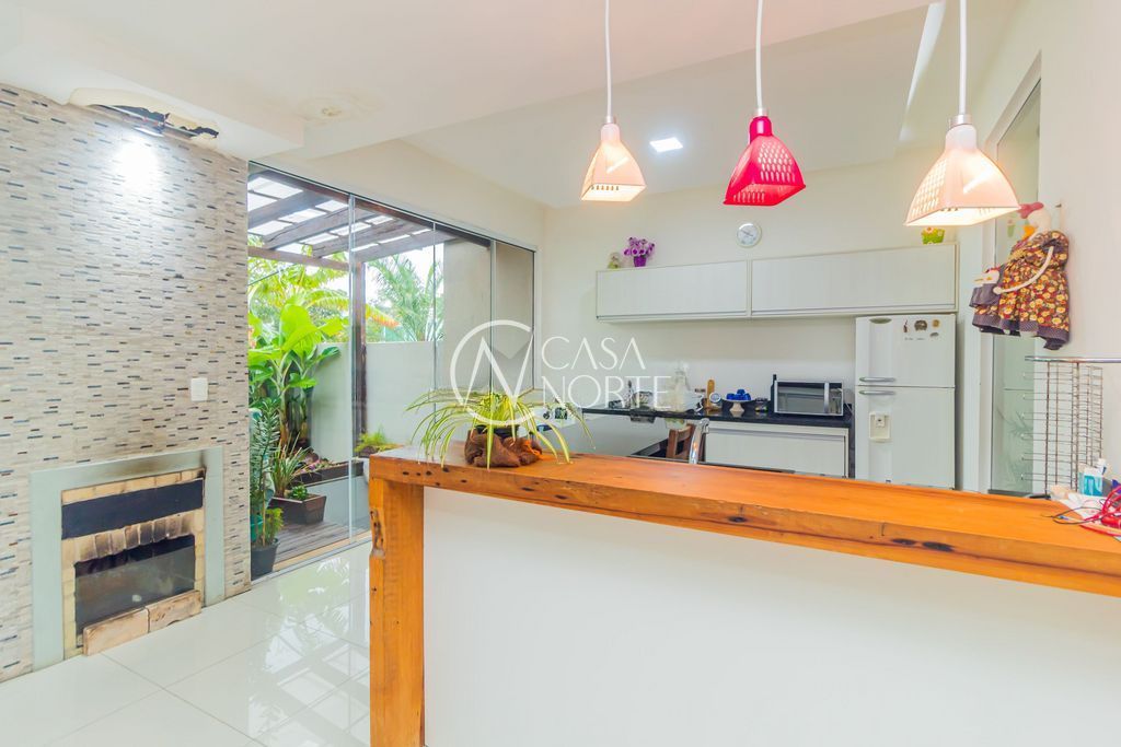 Casa de Condomínio à venda com 3 quartos, 272m², 1 suíte, 6 vagas, Avenida Juca Batista no bairro Hípica em Porto Alegre