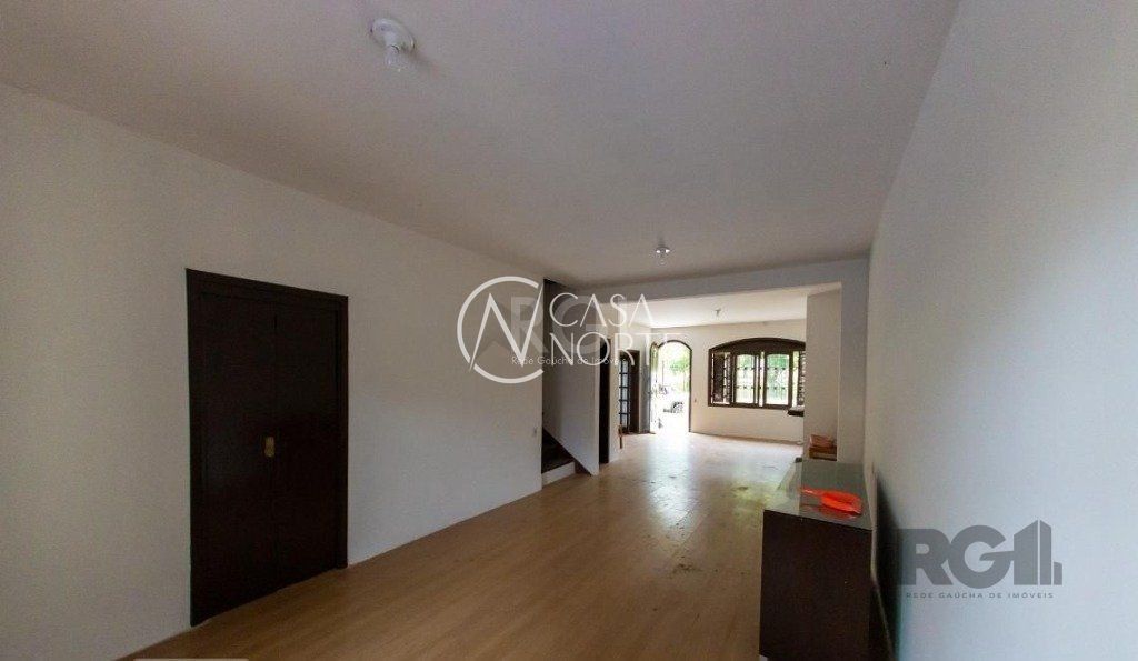 Casa à venda com 4 quartos, 450m², 3 suítes, 5 vagas, Rua Marcio Dias no bairro Nonoai em Porto Alegre