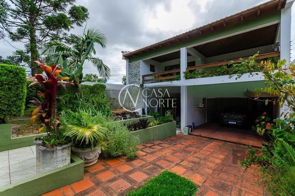 Casa à venda com 3 quartos, 378m², 3 suítes, 2 vagas, Rua Seival no bairro Vila Jardim em Porto Alegre